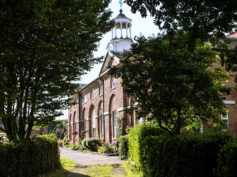 Under the clock tower is the big kitchen and store rooms