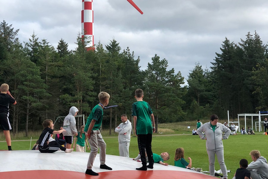 The trampolin is popular - with the famous windmill in the back ground